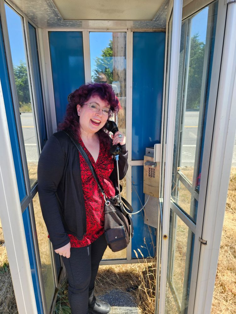 Posing in a defunct costume change booth