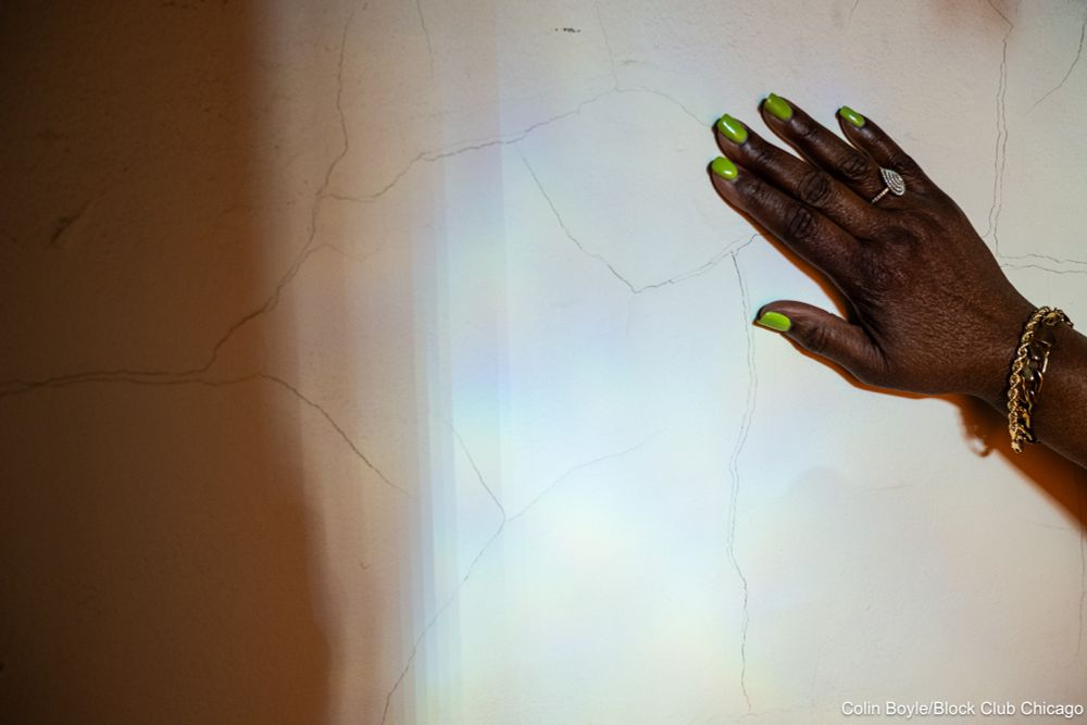 Delores Campbell shows off the cracks in the walls of her home in the Austin neighborhood on June 23, 2025. Credit: Colin Boyle/Block Club Chicago
