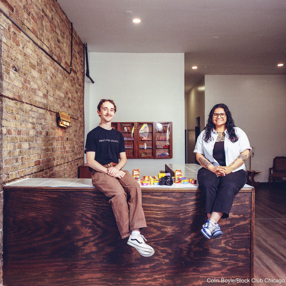 Edward Boyle, lab technician, and Sophie Gomez, founder, pose for a portrait at Constant Agitation Film Lab, 3501 W. Armitage Ave., on June 23, 2025 ahead of their opening in Logan Square. The photo was made on Portra 800 film with a medium format film camera. Credit: Colin Boyle/Block Club Chicago
