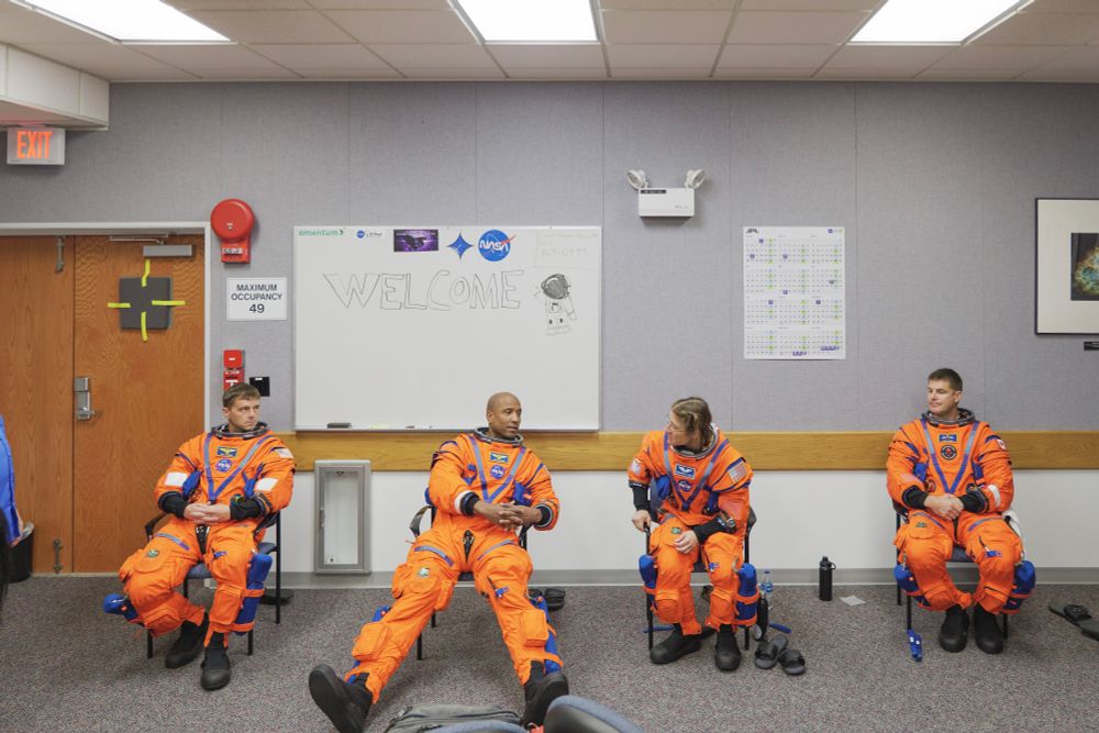 The crew of Artemis II in their Orion Crew Survival System suits during a day of testing with the Orion spacecraft. These are the suits they will be wearing during launch and reentry of the Orion spacecraft during the Artemis II mission.

The crew from left to right are: NASA Astronauts: Commander Reid Wiseman, Pilot Victor Glover, Mission Specialist Christina Koch and Canadian Space Agency Astronaut: Mission Specialist Jeremy Hansen.