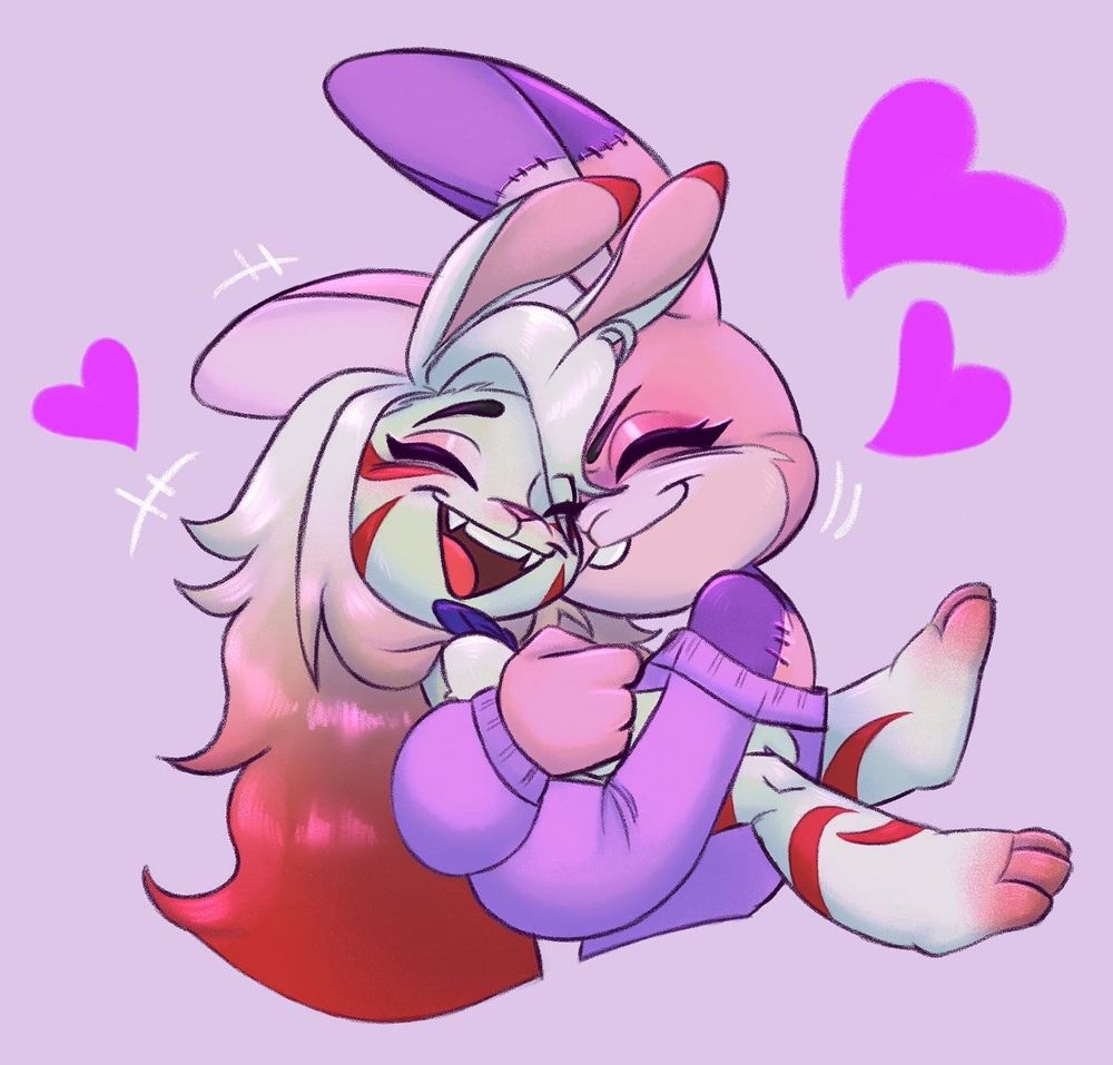 Berry and her child Luna hugging and looking happy 