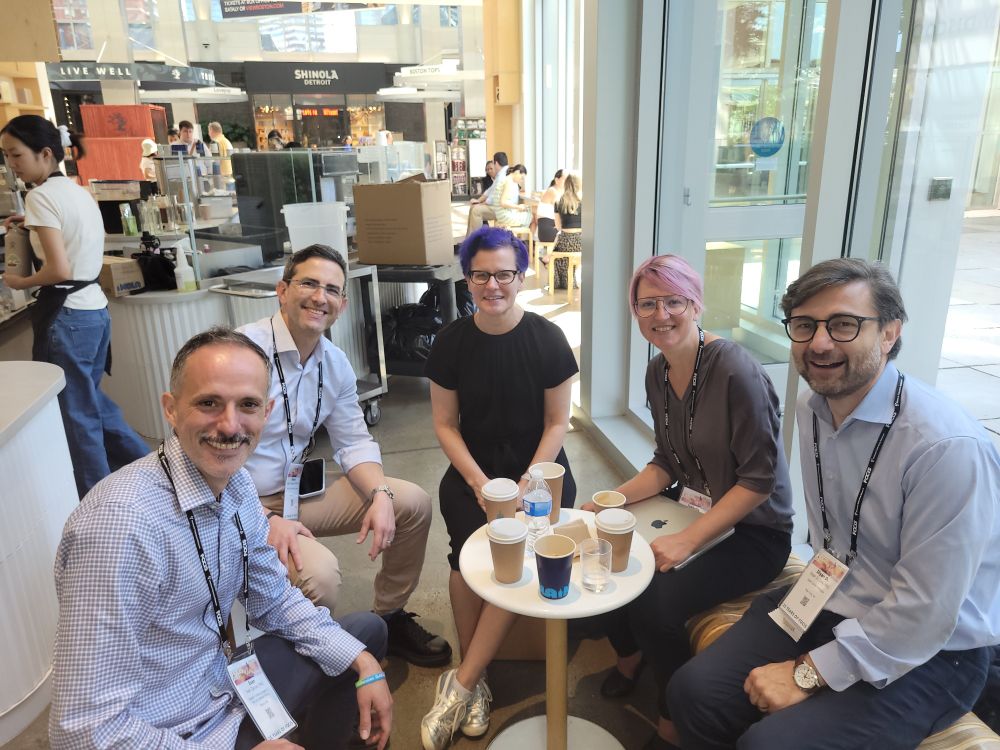 People sitting around a coffee table