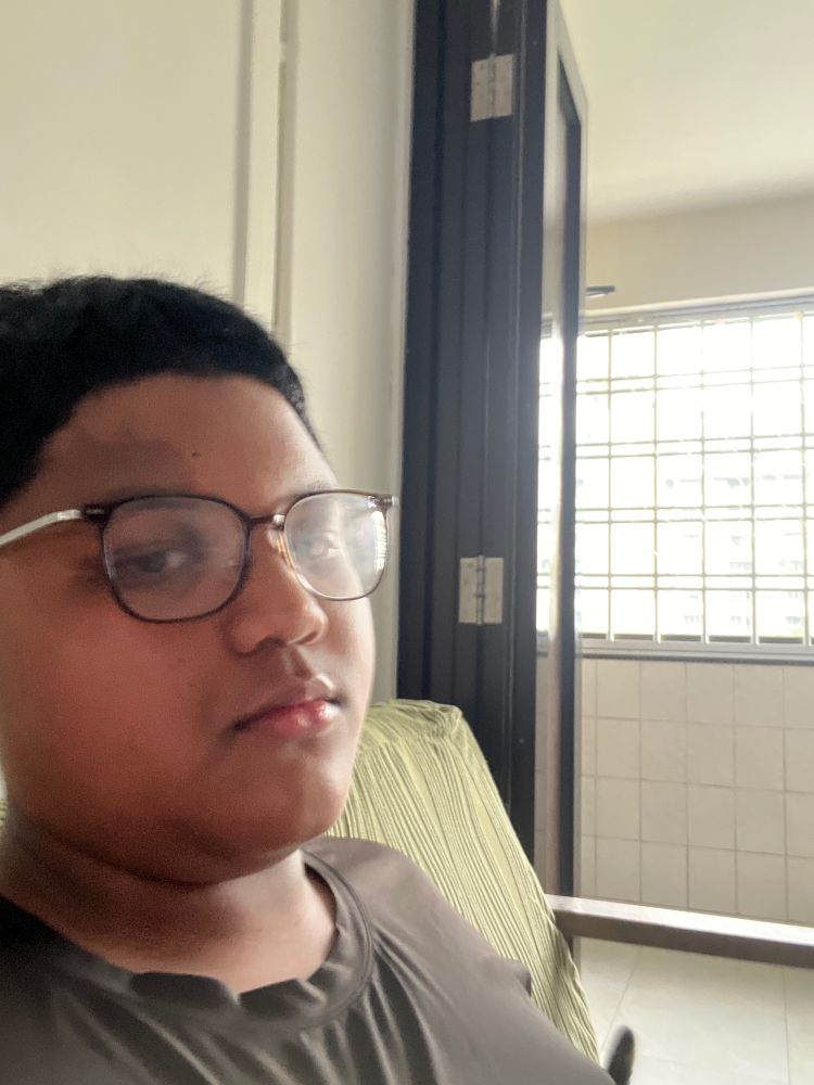 Pose 1: Me sitting on a couch