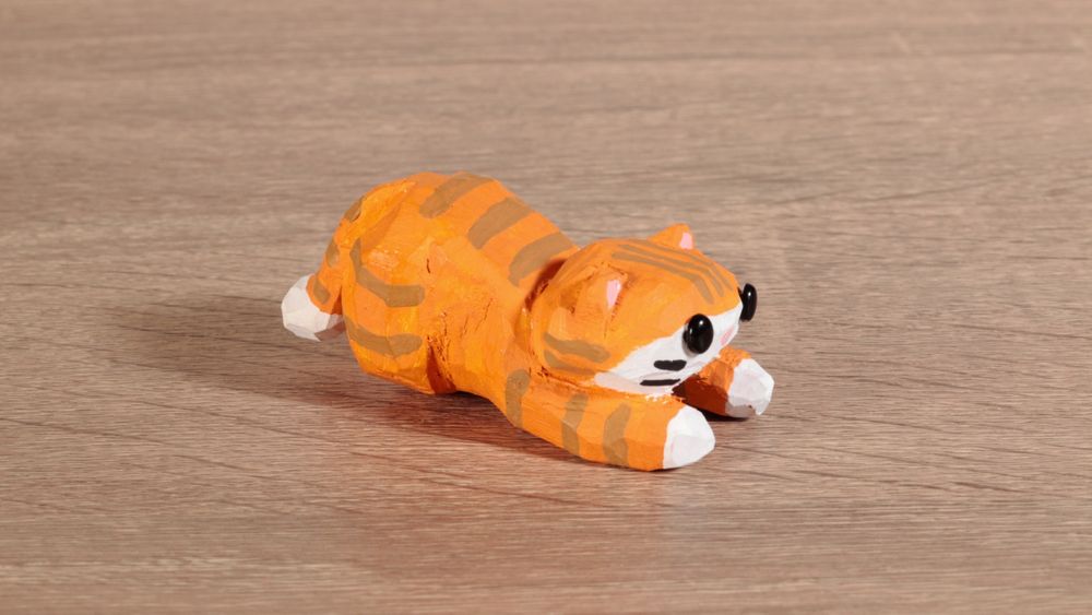 Handmade wooden tabby cat. Used as a fountain pen rest. #art #handmade #journaling #stationery #woodworking