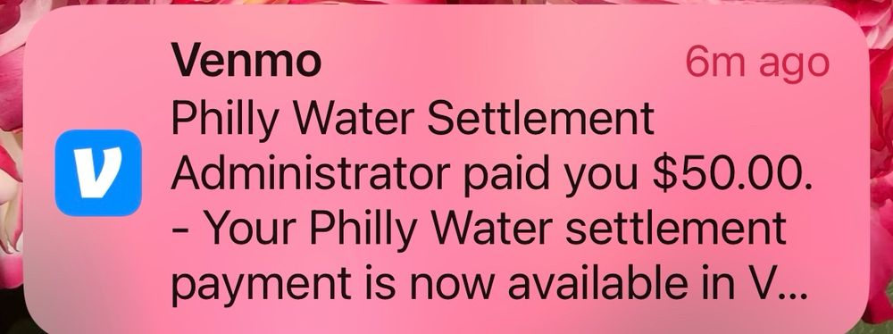A Venmo notification letting me know that "Philly Water Settlement Administrator paid you $50.00"