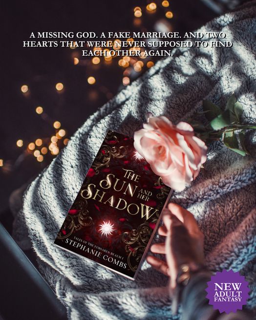 mockup of The Sun and Her shadow by Stephanie Combs on a bed with fairy lights with the words "A missing god. A fake marriage. And two hearts that were never supposed to find each other again." and a new adult fantasy sticker