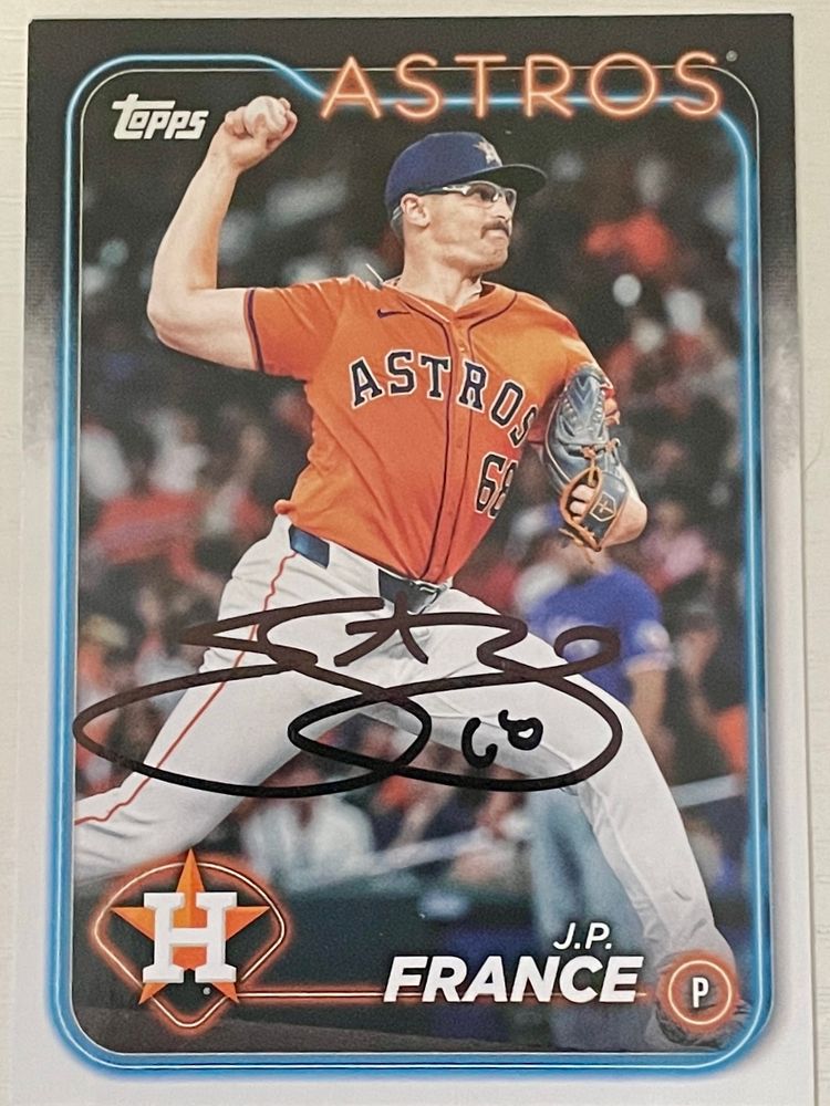A baseball card, autographed by Houston Astros pitcher J.P. France.