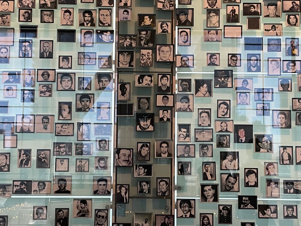 Small selection of black and white photos of the faces of the disappeared of the Pinochet dictatorship, now at its Museum of Memory and Human Rights 