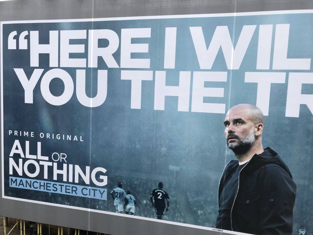 Aguero looked at this massive ad from his English class.