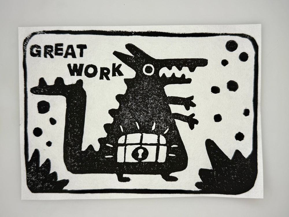 A pillaging dragon with the text “great work”