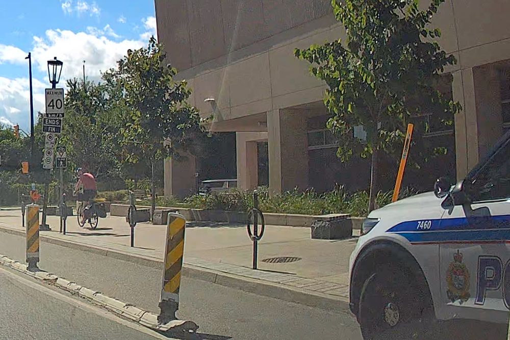Looks like OPS vehicle 7460 is also parked within 3m of a fire hydrant in addition to blocking bike lane and no stopping zone.