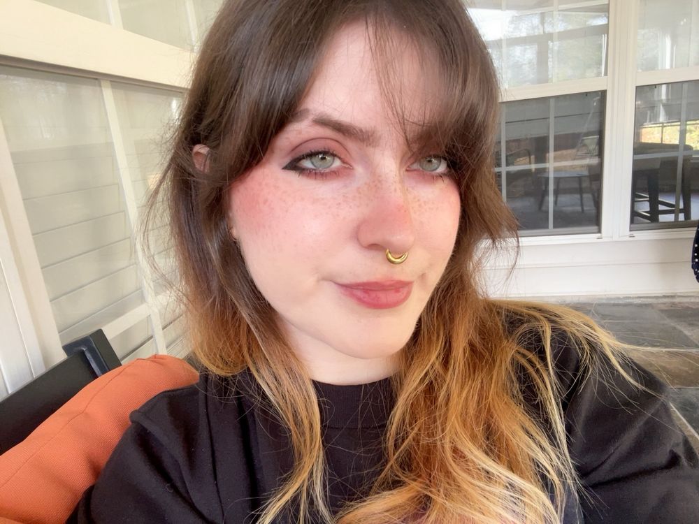 vera selfie but she’s smiling now