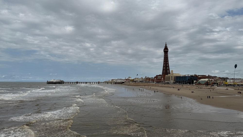 Blackpool Tower, the north pier and beach in the foreground. Picture taken from central pier