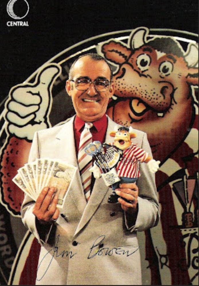Jim Bowen holding cash