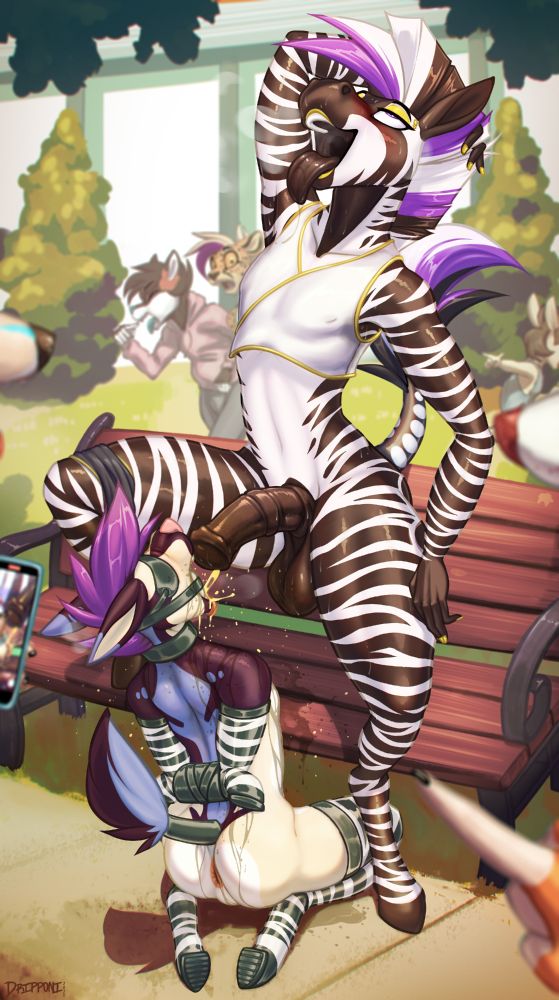 A zebra peeing into a jackal's maw. 