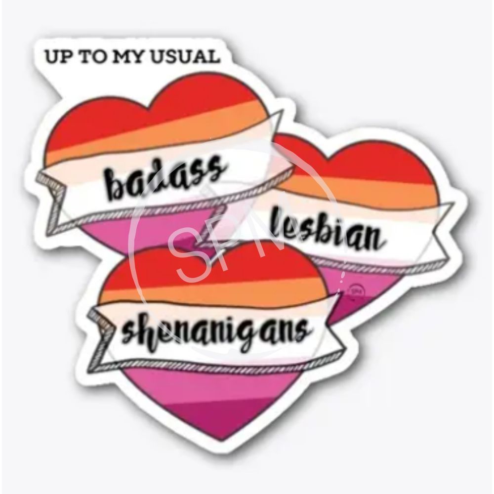 A die-cut sticker with a 3-heart design in the colors of the lesbian pride flag. It reads "up to my usual badass lesbian shenanigans".