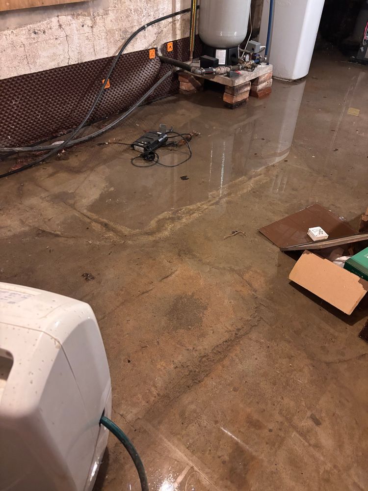 Concrete basement floor under water