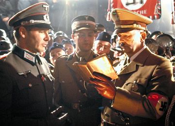A still from Indiana Jones & The Last Crusade in which Hitler signs Henry Jones’ diary