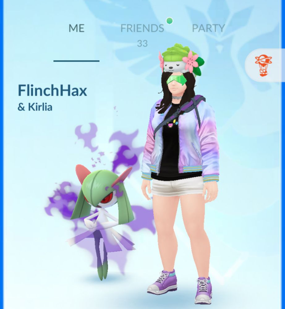 My Pokemon Go avatar, a tall plus size white woman with a pastel colored jacket and bare legs, long black hair topped with a Shaymin plushie and eyes covered by green futuristic sunglasses. The screen name is FlinchHax and the partner pokemon is Shadow Kirlia.