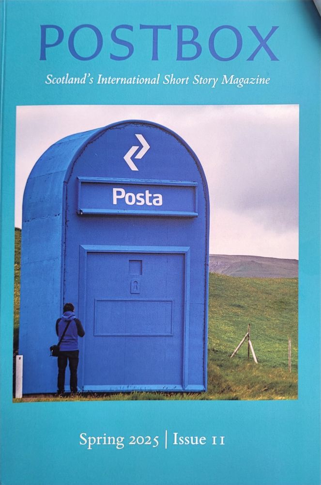 Large blue Faroe Islands postbox with human figure next to it