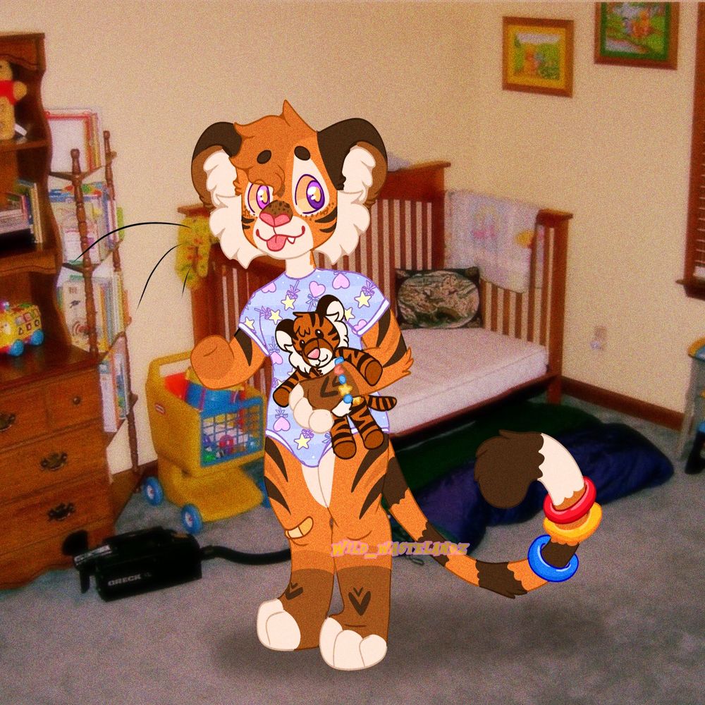My sona Aubade, an anthro tiger cub wearing a purple onesie with stars and hearts on it, holding Spike, a plush tiger. The background is a blurry image of a child’s room 