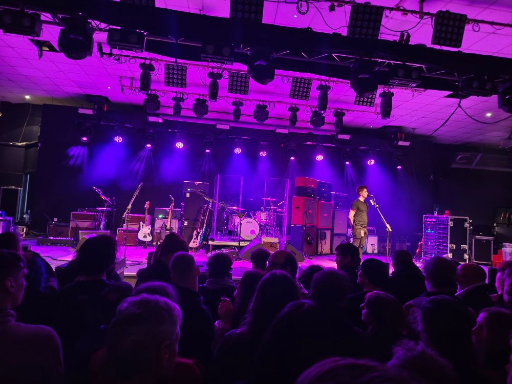 The stage in The National Stadium before My Bloody Valentine started playing. It's lit in their trademark pink and purple.