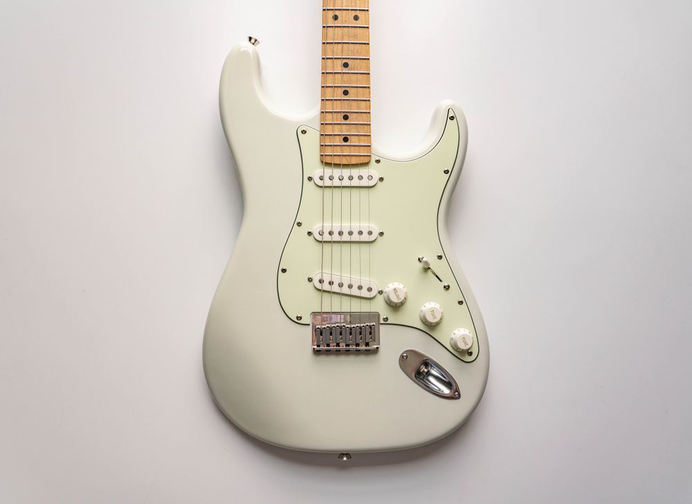 White Stratocaster with maple neck. 