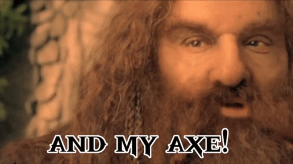 a man with a beard says " and my axe " in front of him