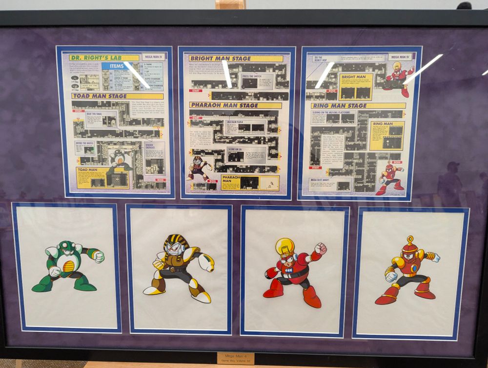 Mega Man artwork and pages from Nintendo Power