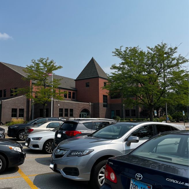 Cars in the library's parking lot.
