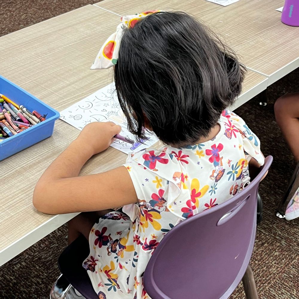 Girl coloring.