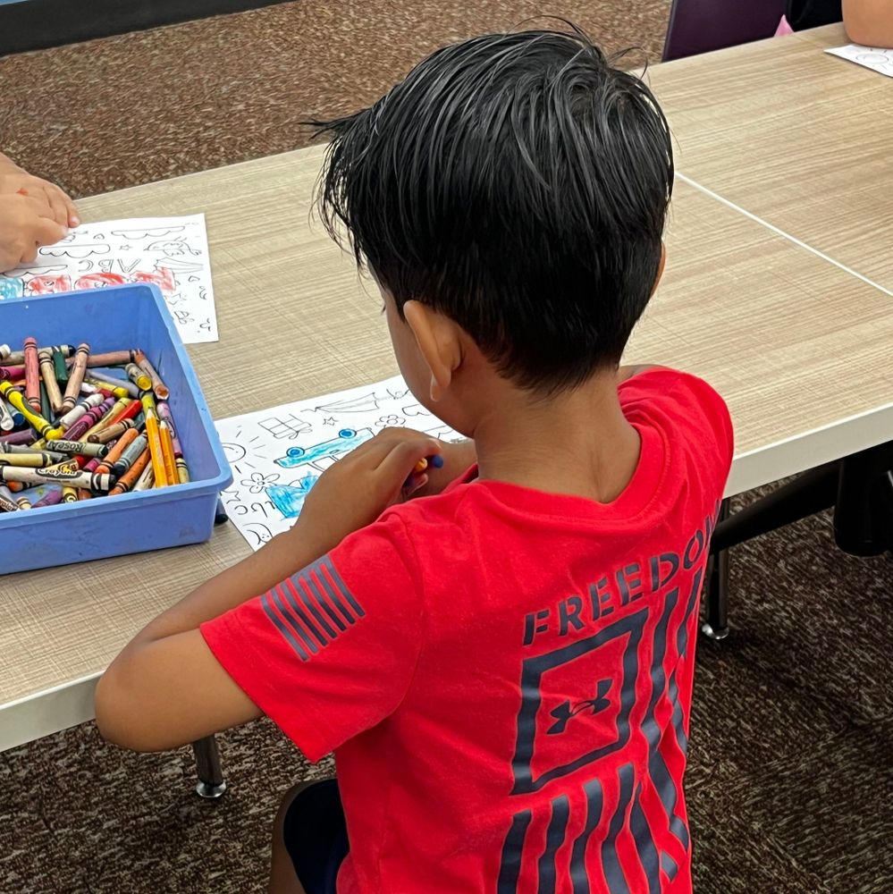 Boy coloring.