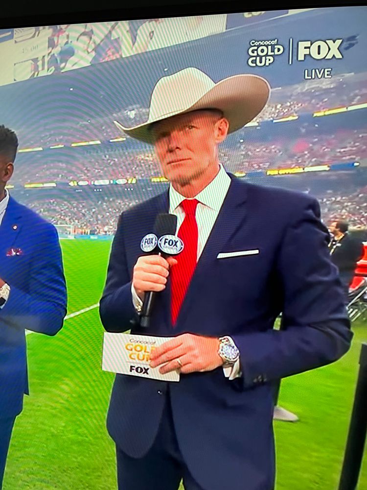 Alexi Lalas being a massive douche wearing a giant cowboy hat.