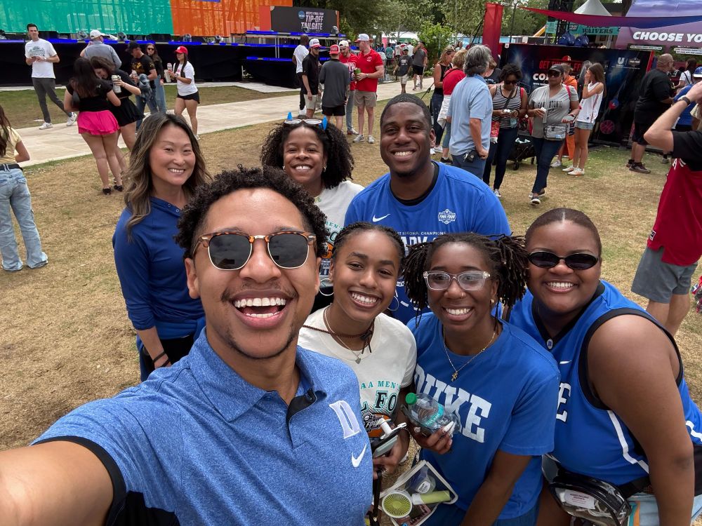 Group selfie with people in Duke shirts