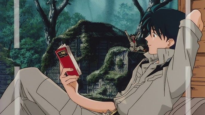 Shirow reading a book in the battle zone