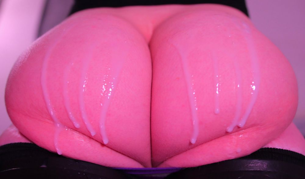 a picture of my butt covered in cum-like lube in a pink hue :)