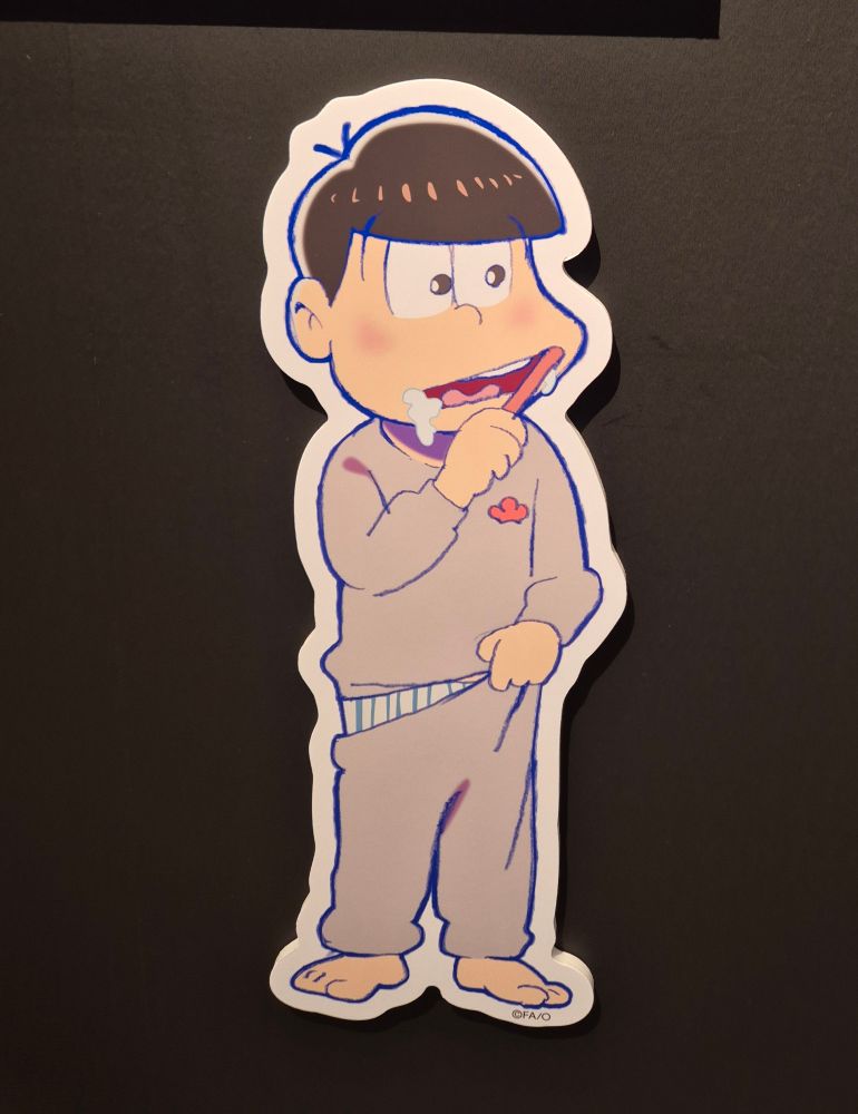 Osomatsu on black background wearing gray sweats, pulling his pants up to cover stripey underwear and brushing his teeth.