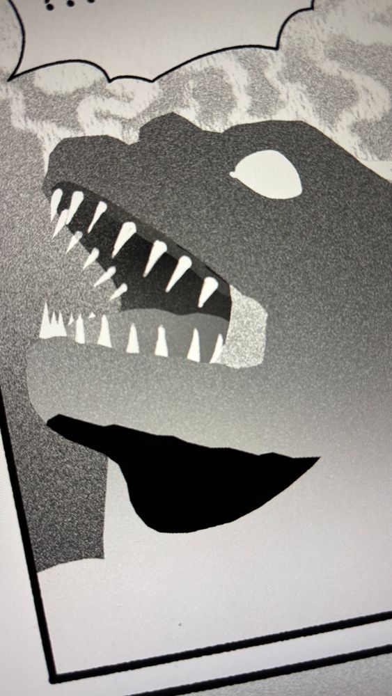 Silhouette of Caiman's head.