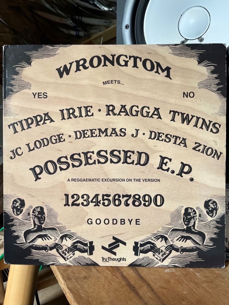 My copy of the Possessed EP on vinyl featuring artwork based on a quija board. Tru Thoughts label boss was a bit unsure about releasing a record with a ouija board cover after an aunty told a story about her friend having a bad experience with one, and it had stayed with him since he was 8 years old. He may have had a point because it probably put a few reggae heads off buying it