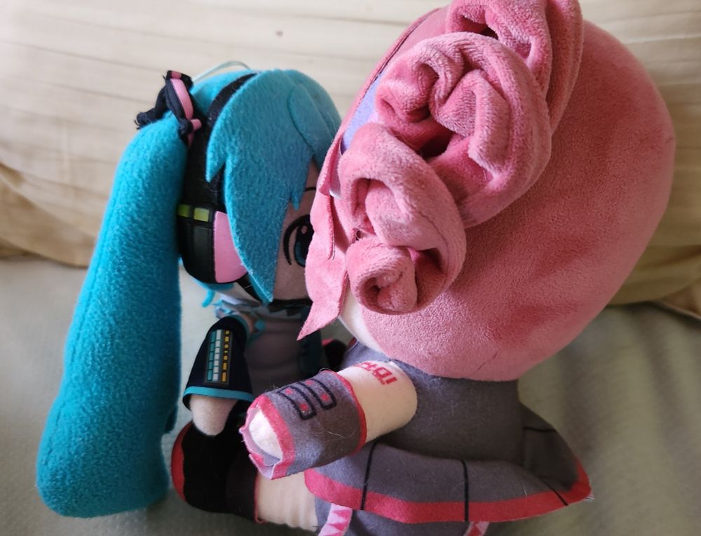 hatsune miku plush and kasane teto plush kissing