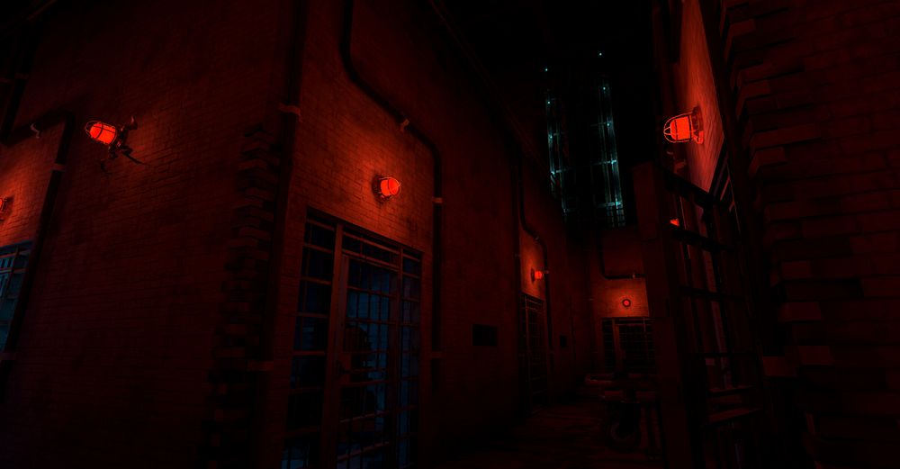 Screenshot of VR Game "Hello Cruel World" of the player in a maze of jail cells with an elevator towering over them.