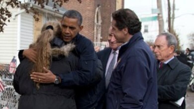 Obama, Schumer, Cuomo, and Bloomberg at Superstorm Sandy recovery presser on Staten Island, NYC via Gothamist November 15, 2012
