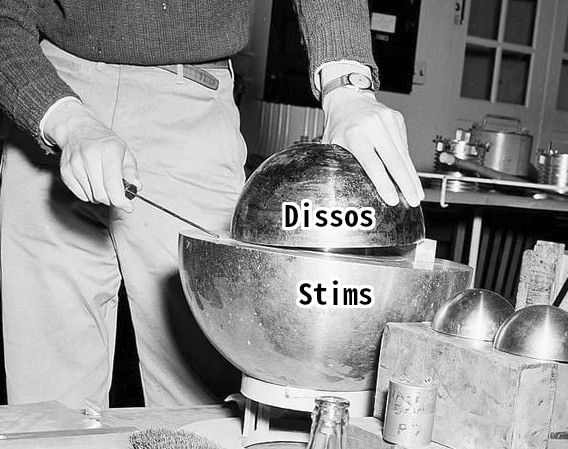 Slotin with the demon core, top hemisphere is labeled "Dissos", bottom is labeled "Stims".