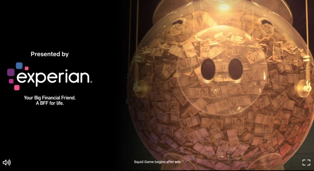 Screenshot of an ad playing during Squid Games. This shows that it is presented by "Experian, your big financial friend", next to a giant piggy bank full of money