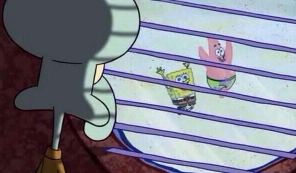 Squidward sadly looking out window at Patrick and SpongeBob frolicking 