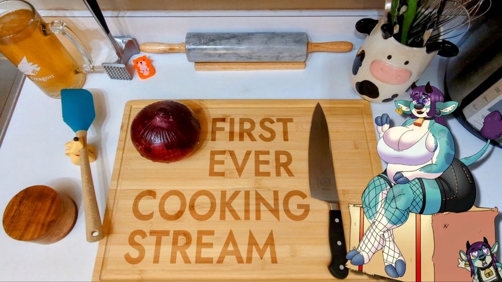 A blue cow png tuber (me) overlayed over an IRL shot of my kitchen counter with a cutting board, knife, red onion, and plenty of little critter cohosts.  The cutting board has big bold text on it that reads "FIRST EVER COOKING STREAM"