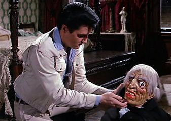 Elvis close to a monster puppet (film Tickle me 1965)