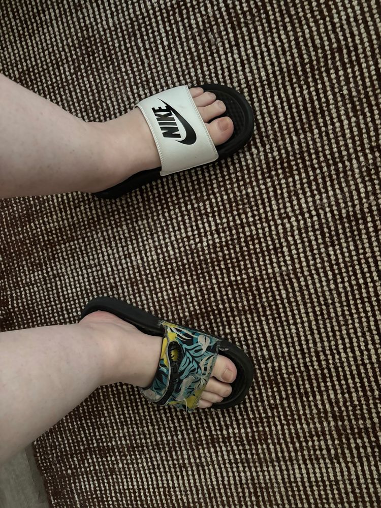 Photo of my feet in 2 different sandals. 