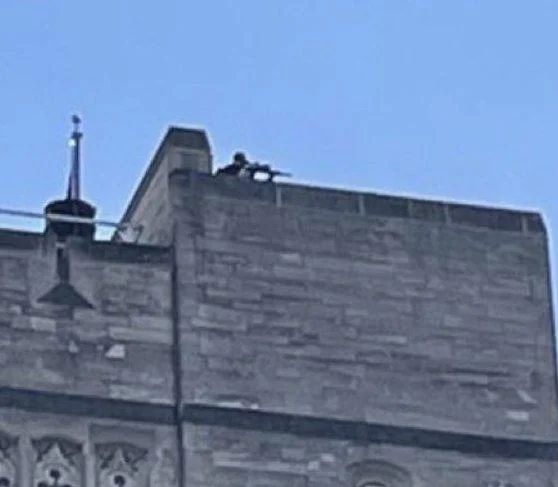 Snipers on roof of IMU Indiana University.