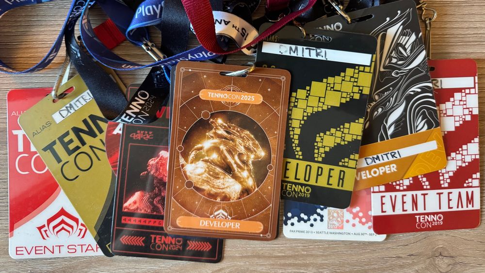 It’s a photo of my Warframe event badges from over the years. At the top is my developer badge for TennoCon 2025.